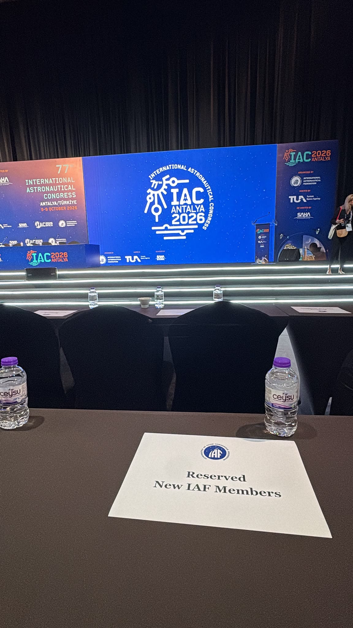Table reserved for new IAF members in front of the IAC 2026 stage